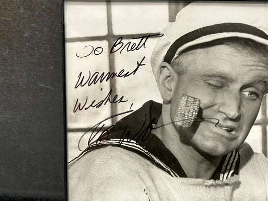 10x8 Framed 1980 Paramount Pictures and Walt Disney Productions "Popeye The Saylor Man" signed by Robert Williams